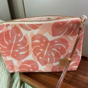 Jana Lam orange and cream colors in Monstera pattern.  13 x 8 x3 nice size